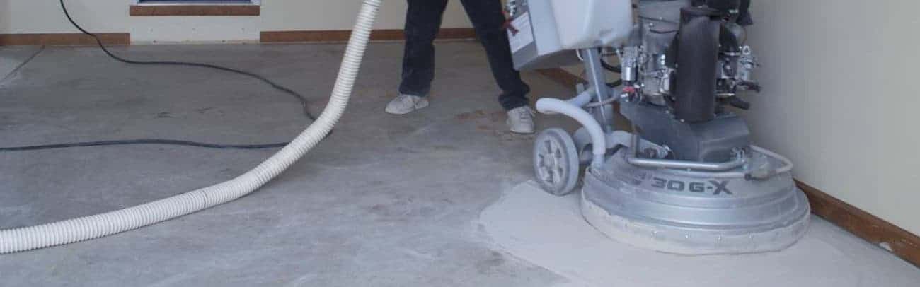 concrete preparation with grinders epoxy polyurea polyaspartic garage floor coating