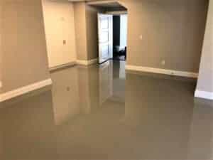 solid epoxy flooring in basement moisture mitigating improves air quality issues musty odors safe for interior installation